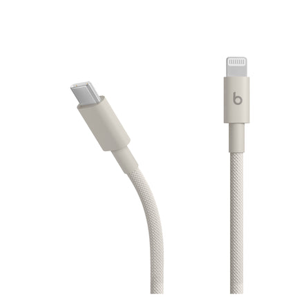 Detailfoto van de Beats USB-C-naar-Lightning-kabel in Surge Stone